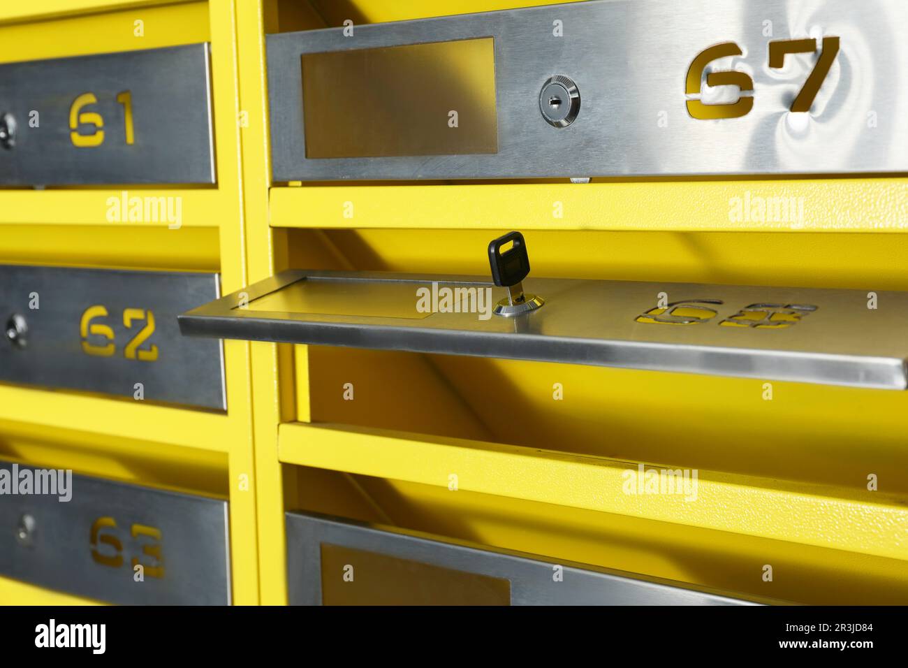 Open metal mailbox with key and numbers, closeup Stock Photo Alamy