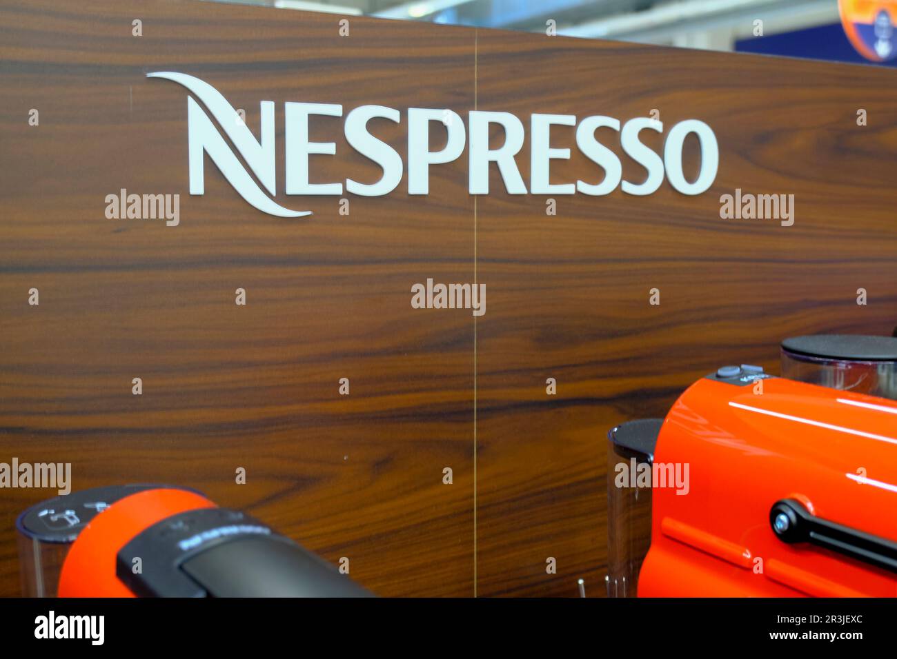 April 2023 Milan, Italy: Nespresso logo icon closeup in the electronic store. Nespresso coffee machine closeup Stock Photo