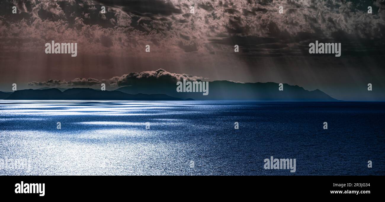 Sun rays through the clouds Stock Photo - Alamy