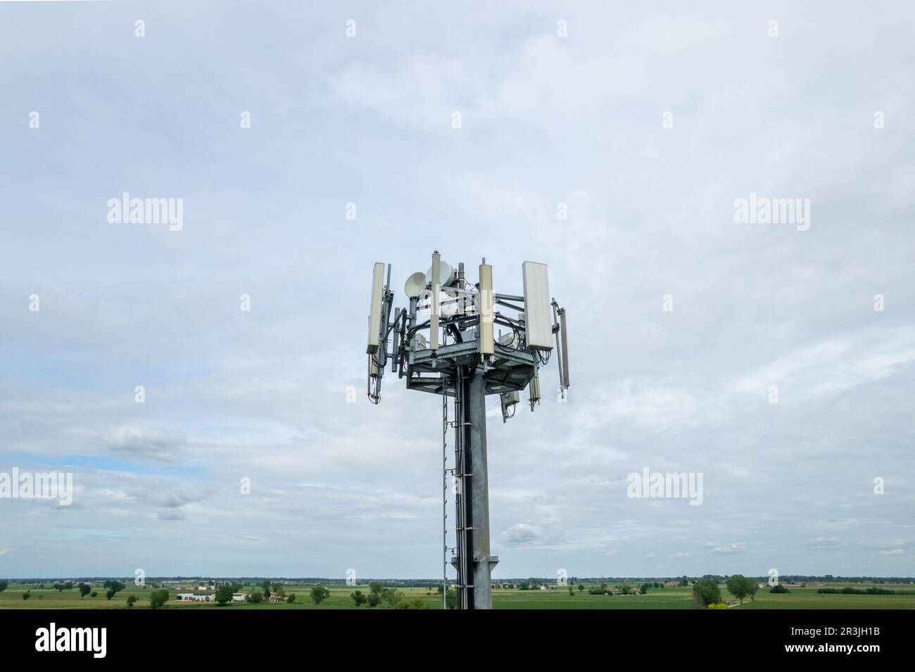 5G Cell Towers on countryside rural background in Italy Stock Photo