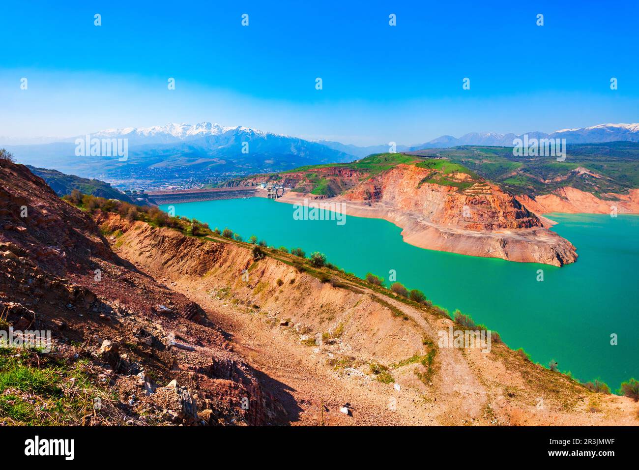 Lake Charvak or Chorvoq is a water reservoir in Chimgan region, Tian Shan  or Tengri Tagh mountain range near Taskent city in Uzbekistan Stock Photo -  Alamy