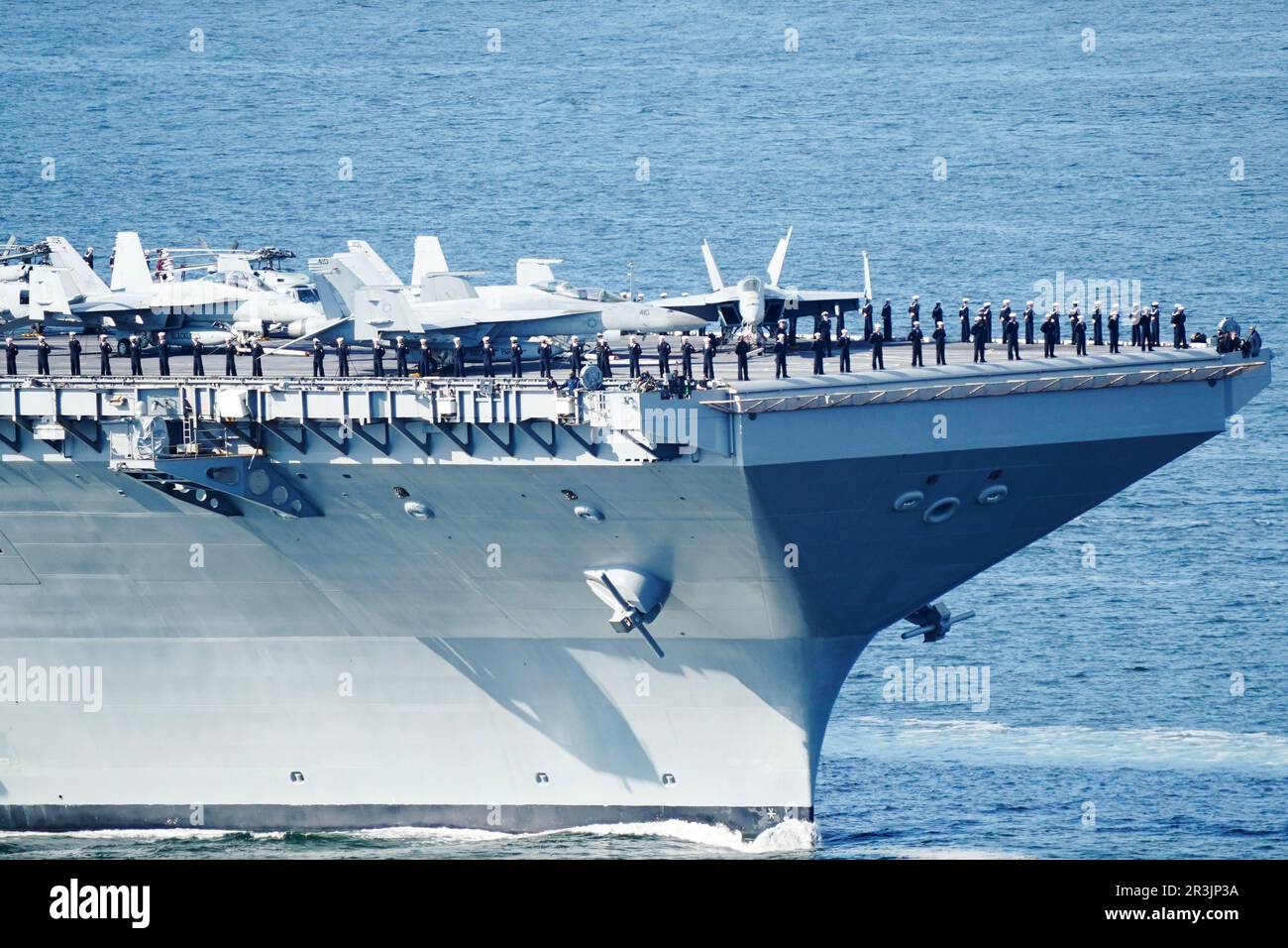 Moss 20230524.American soldiers protect the American aircraft carrier USS Gerald R. Ford on its way into the Oslo Fjord, here at Droebak on Wednesday morning. The ship is the world's largest warship and will be in port in Oslo for four days. Photo: Terje Pedersen / NTB Stock Photo