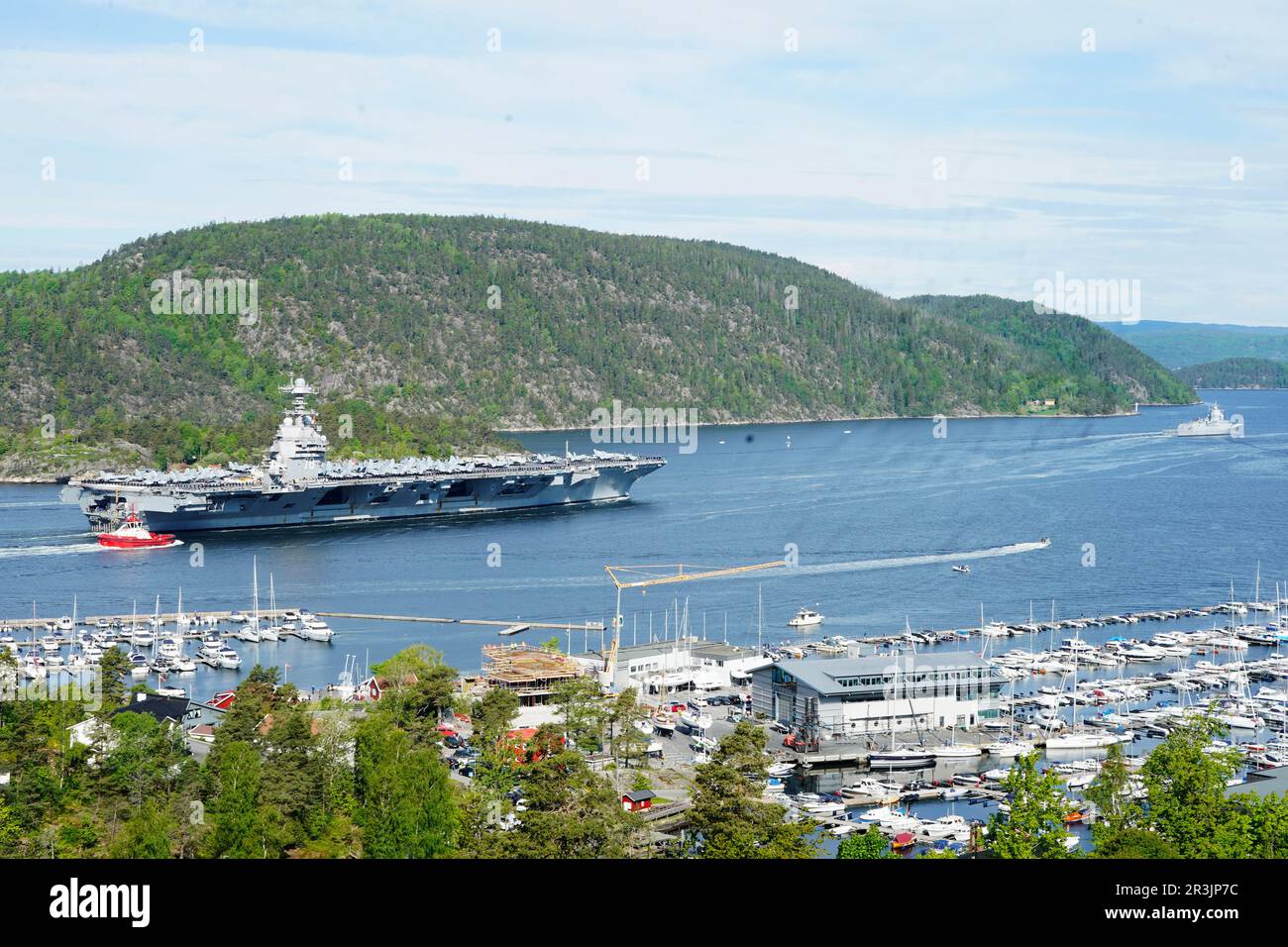Moss 20230524.The American aircraft carrier USS Gerald R. Ford on its way into the Oslo Fjord, here in Droebak on Wednesday morning. The ship is the world's largest warship and will be in port in Oslo for four days. Photo: Terje Pedersen / NTB Stock Photo