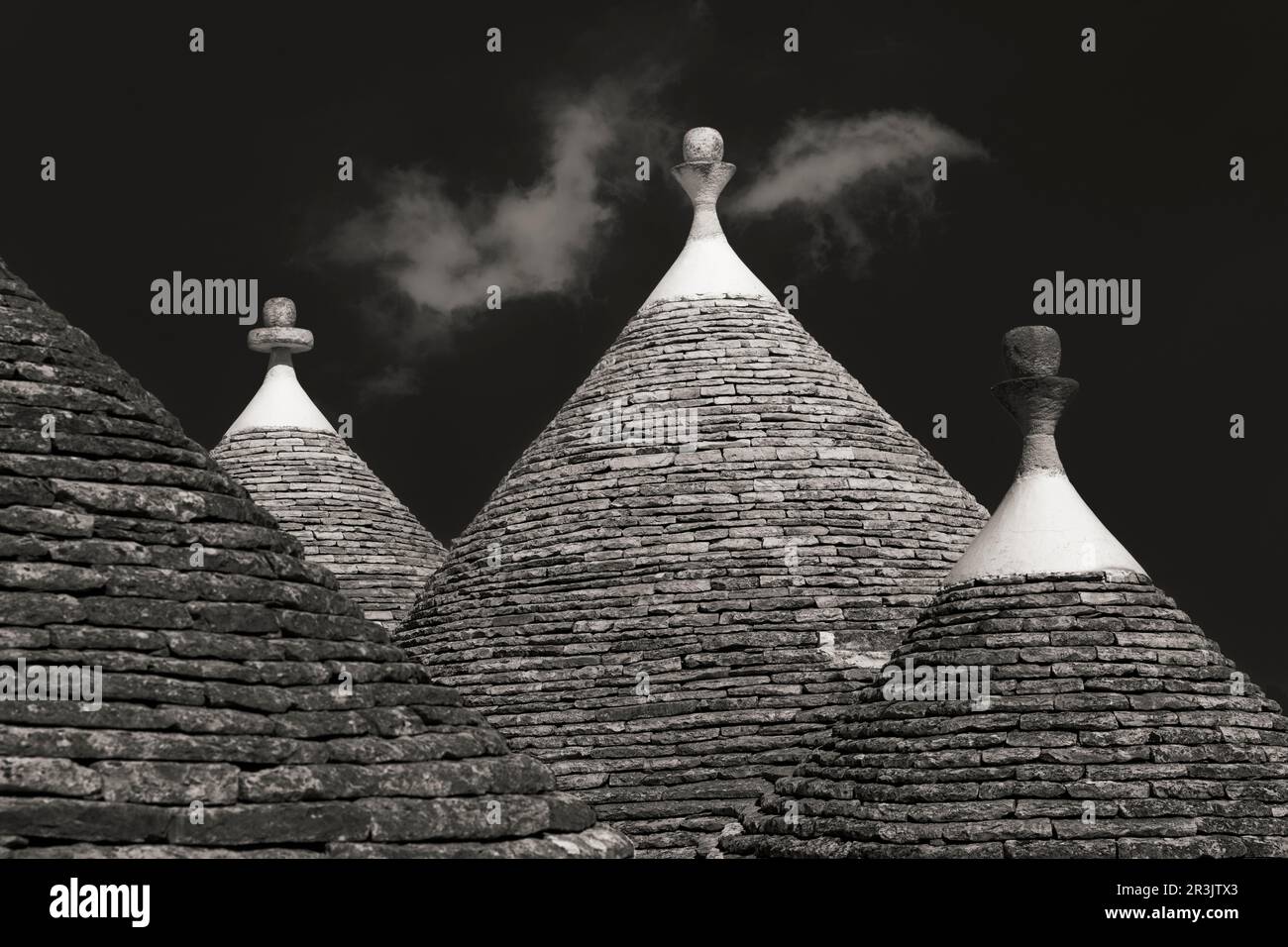 Roofs of typical trullo houses (trulli) in Apulia, Italy Stock Photo