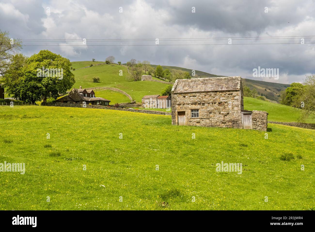 Keld is a tiny village at the top of Swaledale in the North Yorkshire Dales. It’s the crossing point between the two most important long distance walk Stock Photo