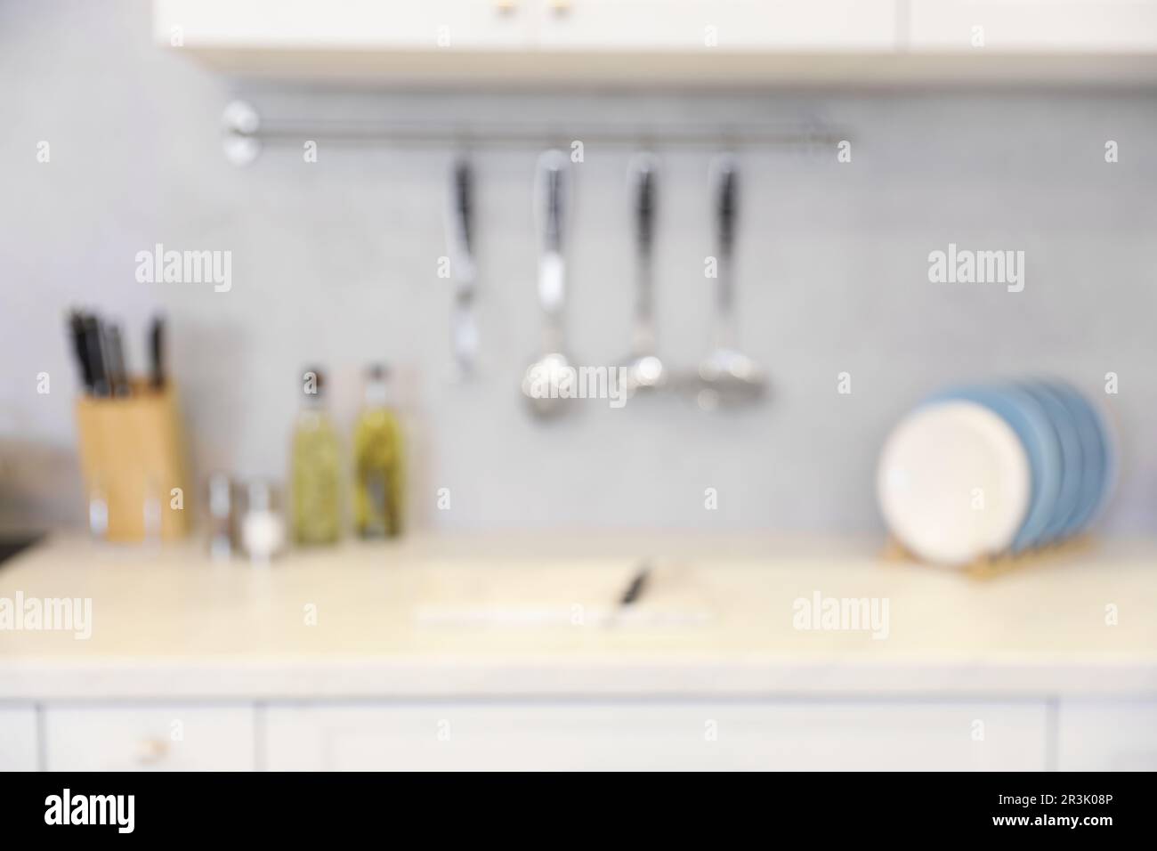 Blurred view of modern kitchen. Interior design Stock Photo - Alamy