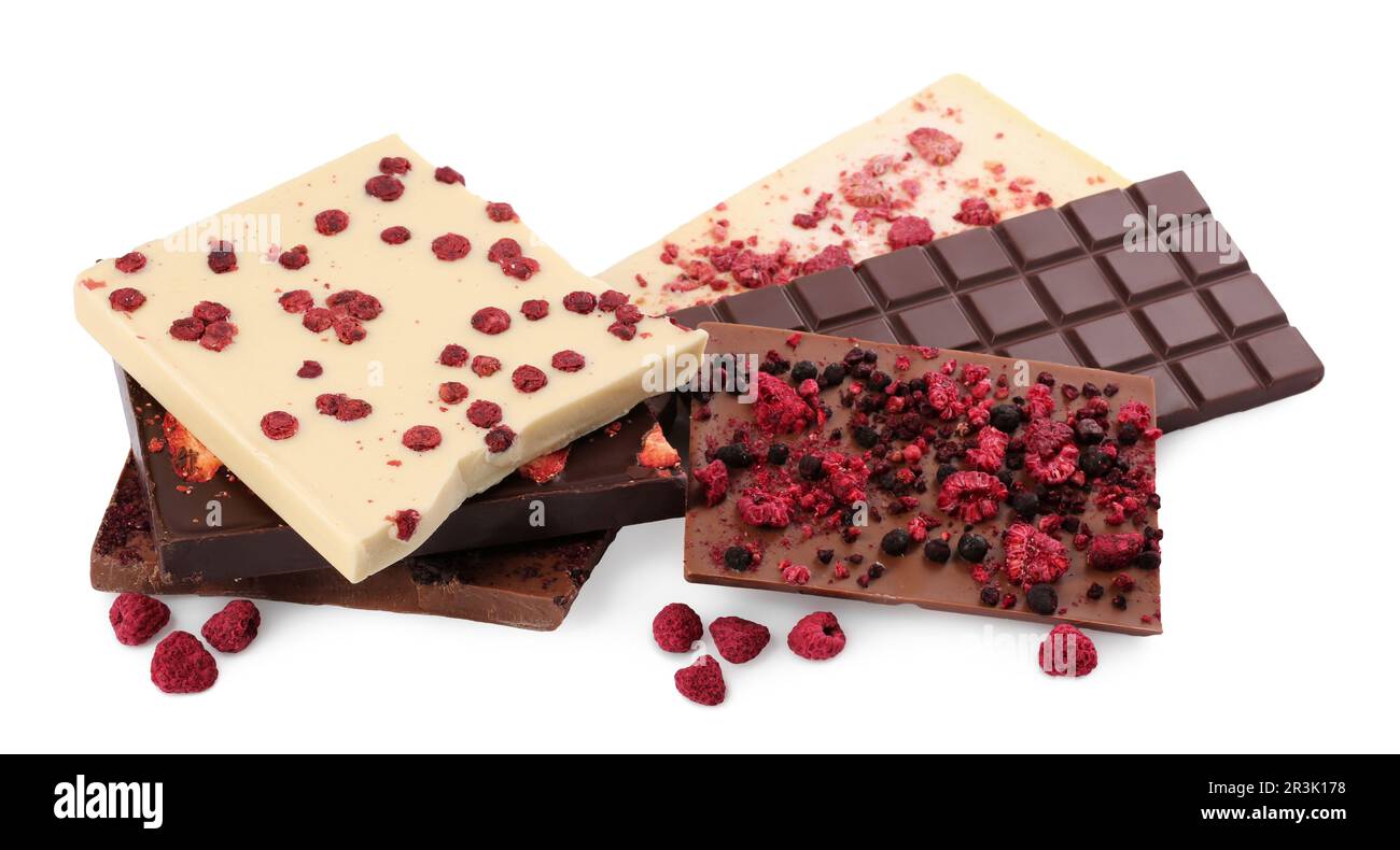 Chocolate bars with freeze dried berries on white background Stock ...