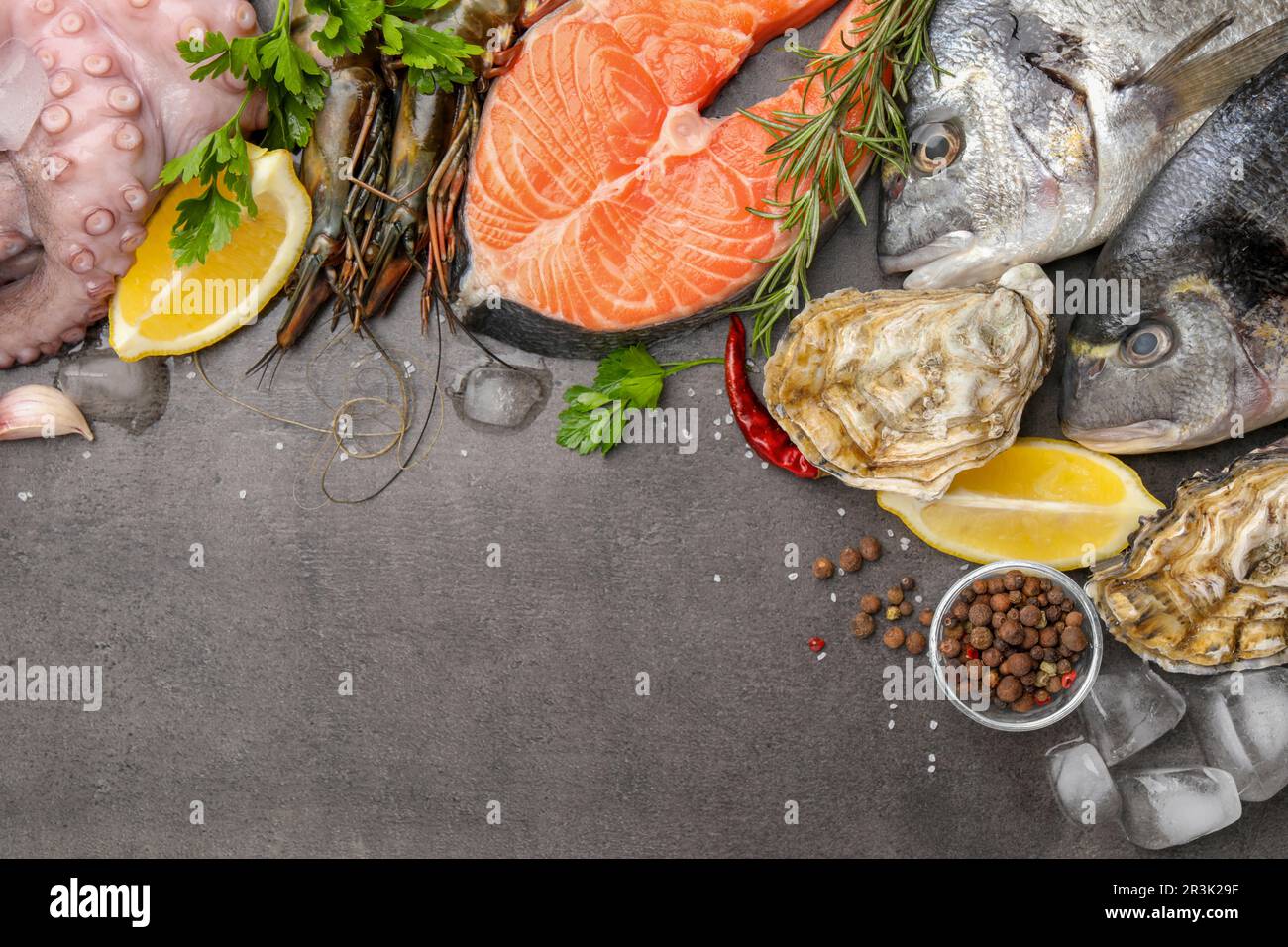 Flat lay composition with fresh raw dorado fish and different seafood ...
