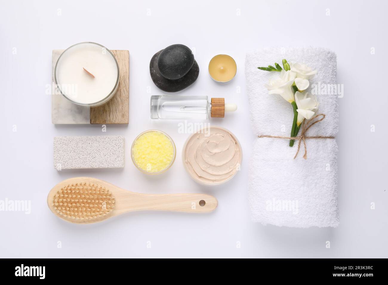 Flat lay composition with different spa products on white background ...