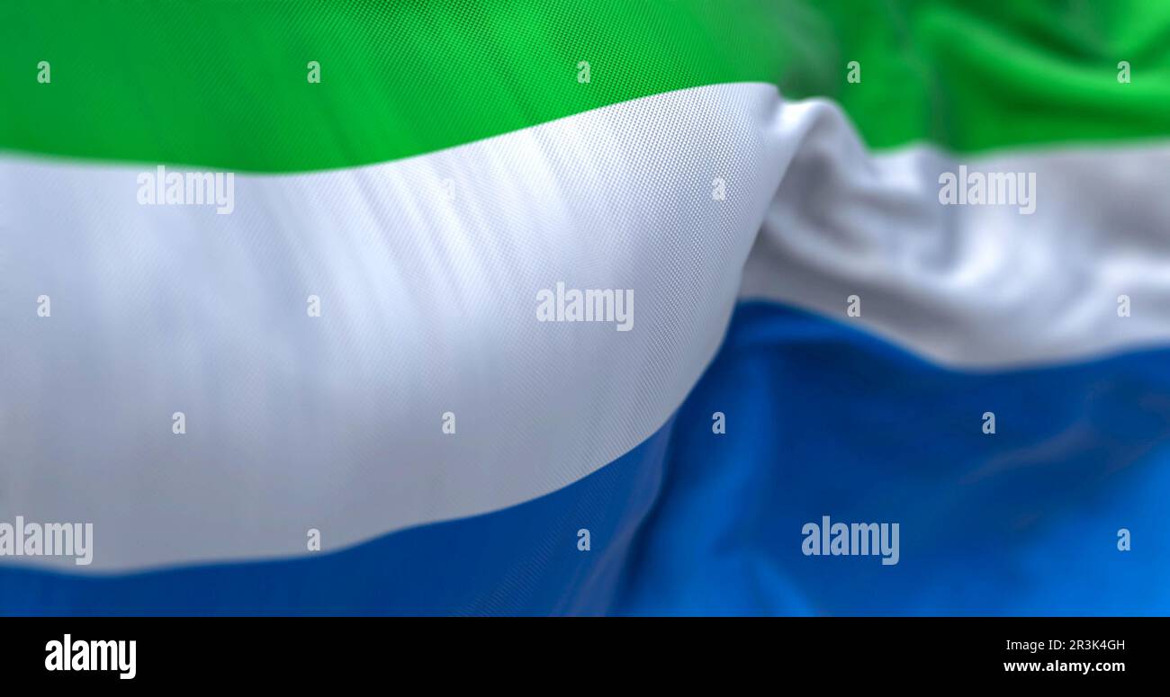 Detail of the Sierra Leone national flag waving in the wind Stock Photo ...