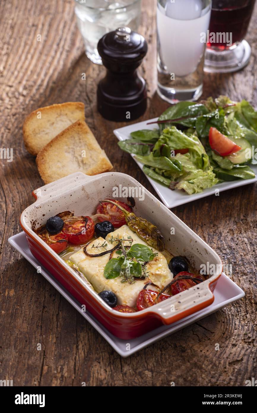 Grilled feta in casserole Stock Photo Alamy