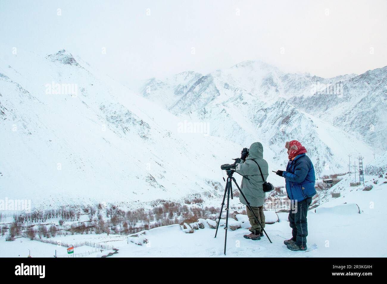 Spotters looking for the snow leopard, Himalayas, Rumbak village