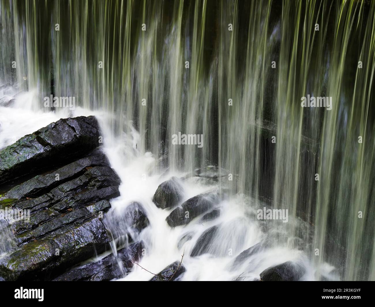 Weir at Long Dam in Skipton Castle Woods Skipton North Yorkshire England Stock Photo