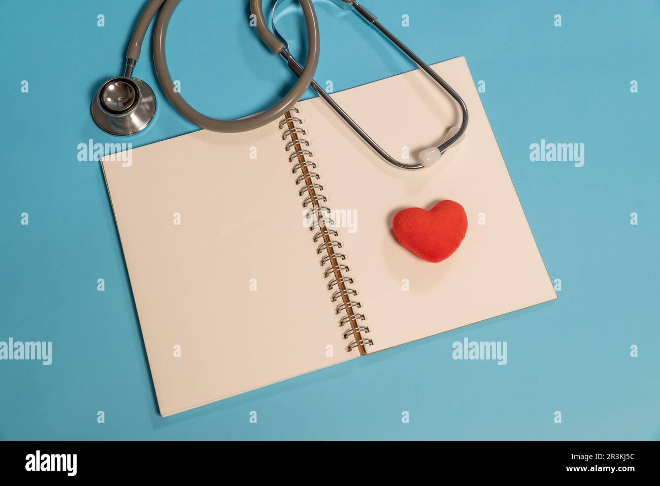 Single Head Stethoscope with heart on light blue background Stock Photo ...