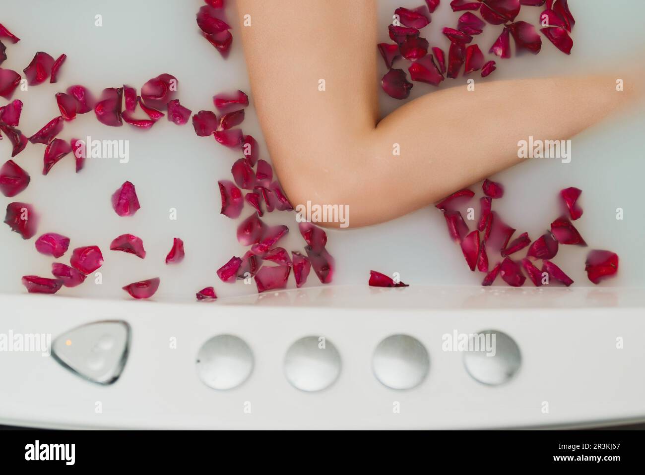 Bathtub filled with foam and rose petals prepared for romantic date Stock  Photo - Alamy