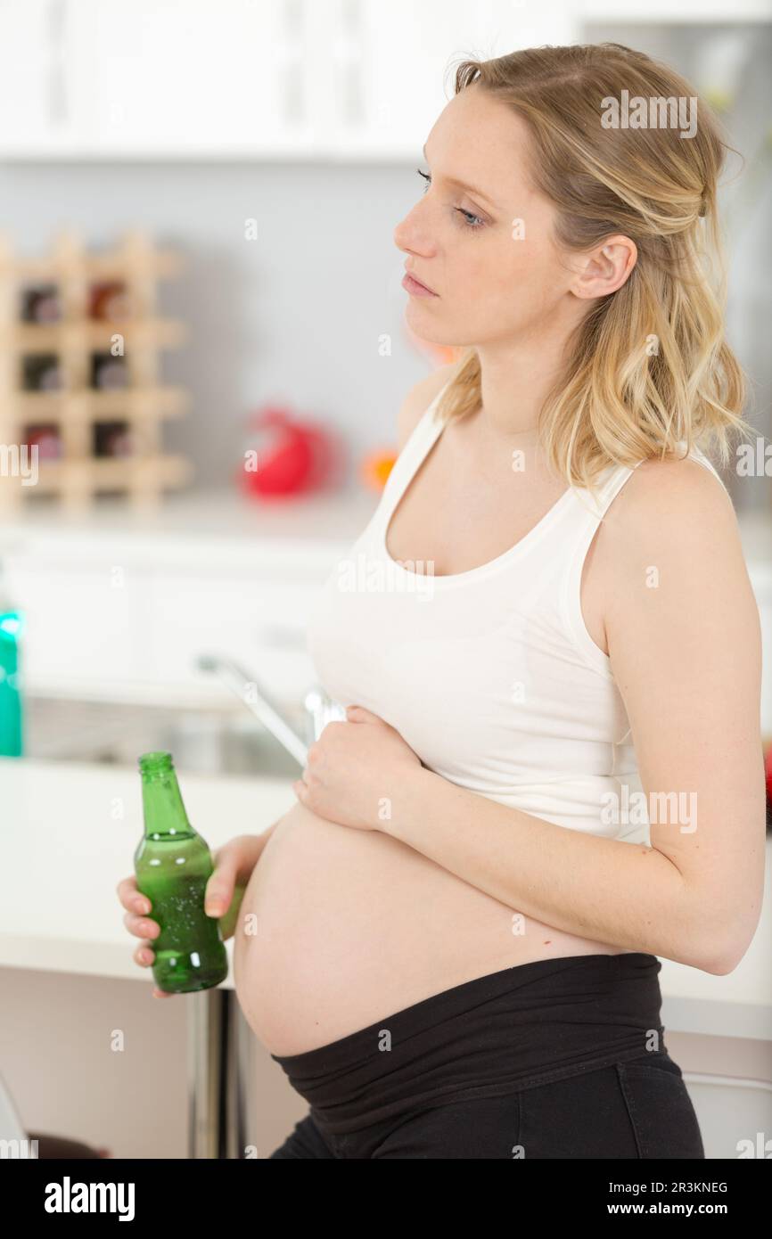 a pregnant woman drinks alcohol Stock Photo Alamy