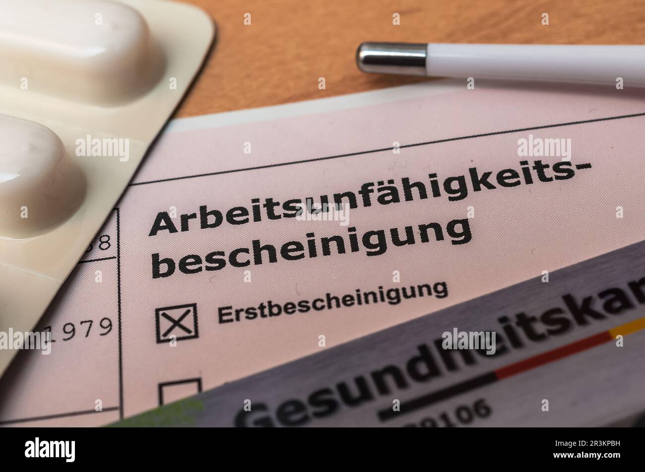 Certificate of incapacity for work - sickness certificate in Germany Stock Photo