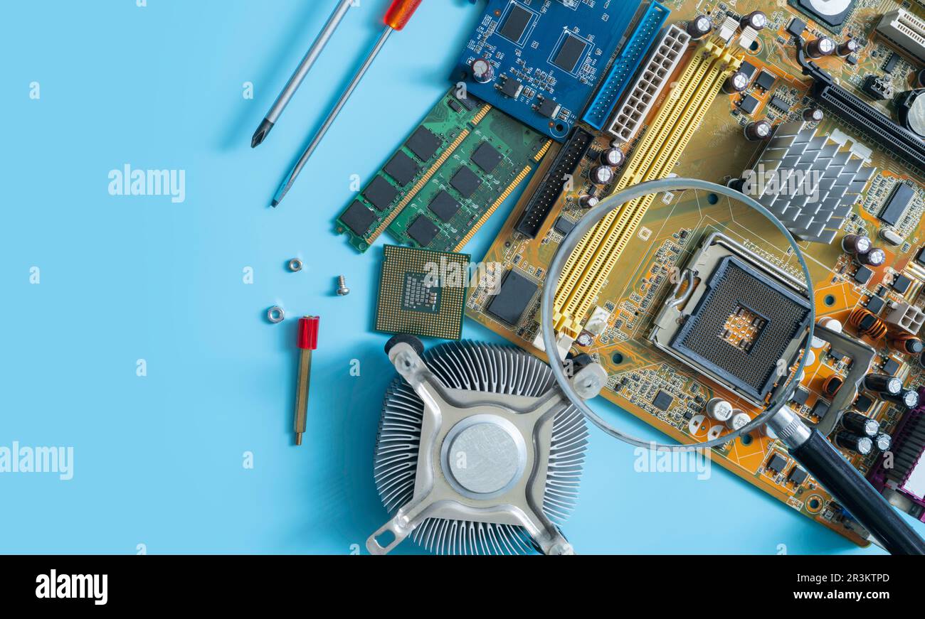 Computer chip and magnifying glass. Chipset on electronic circuit board ...