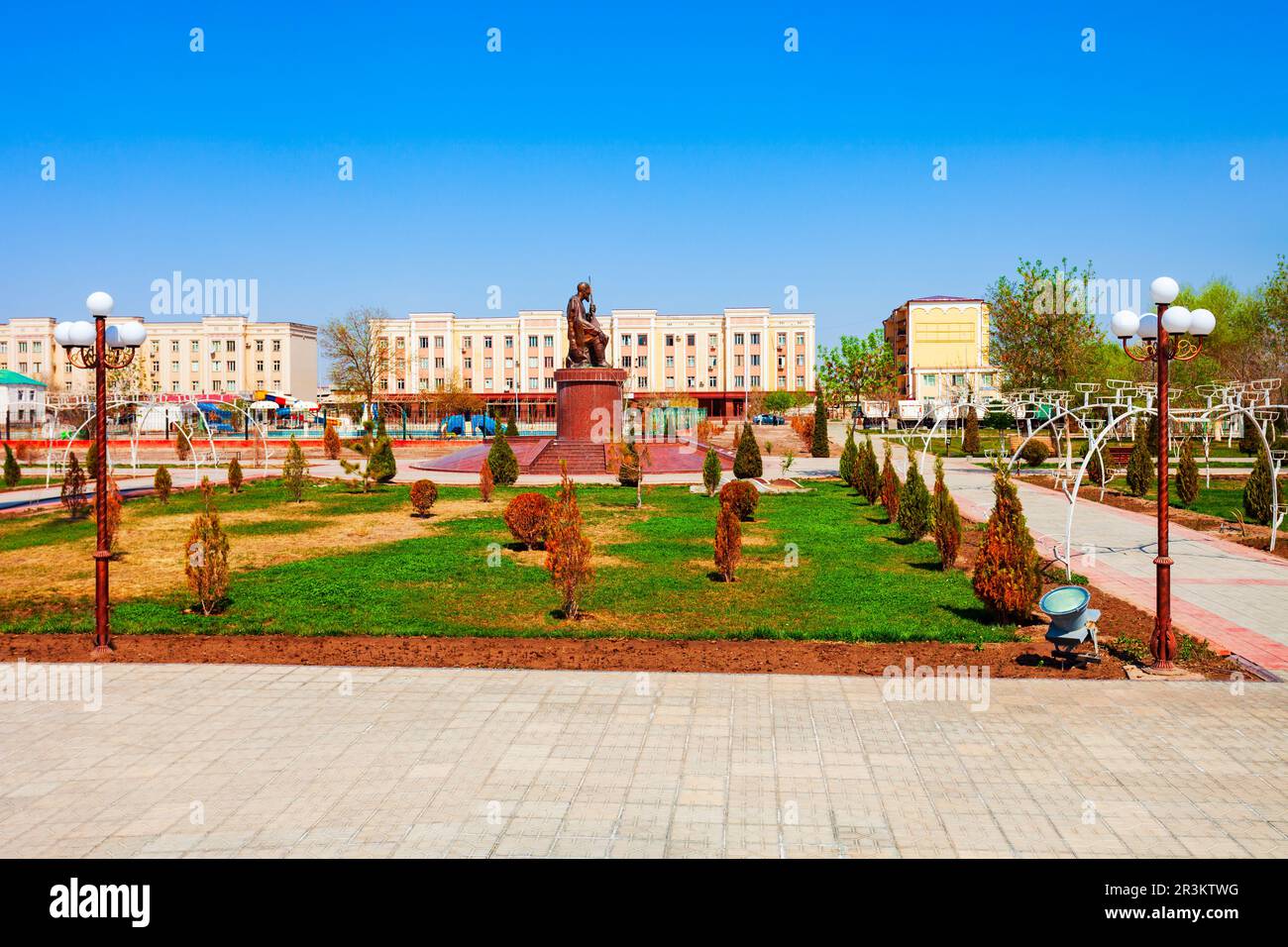 Nukus, Uzbekistan - April 14, 2021: Ajiniyaz or Azhiniyaz monument in Nukus city, Karakalpakstan region of Uzbekistan. Ajiniyaz was a Karakalpak poet. Stock Photo