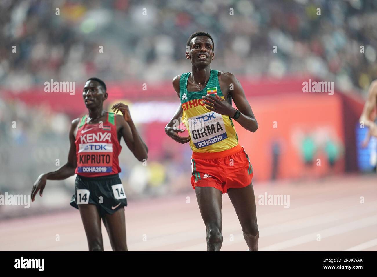 Lamecha Girma participating in the 3000 meter steeplechase at the Doha