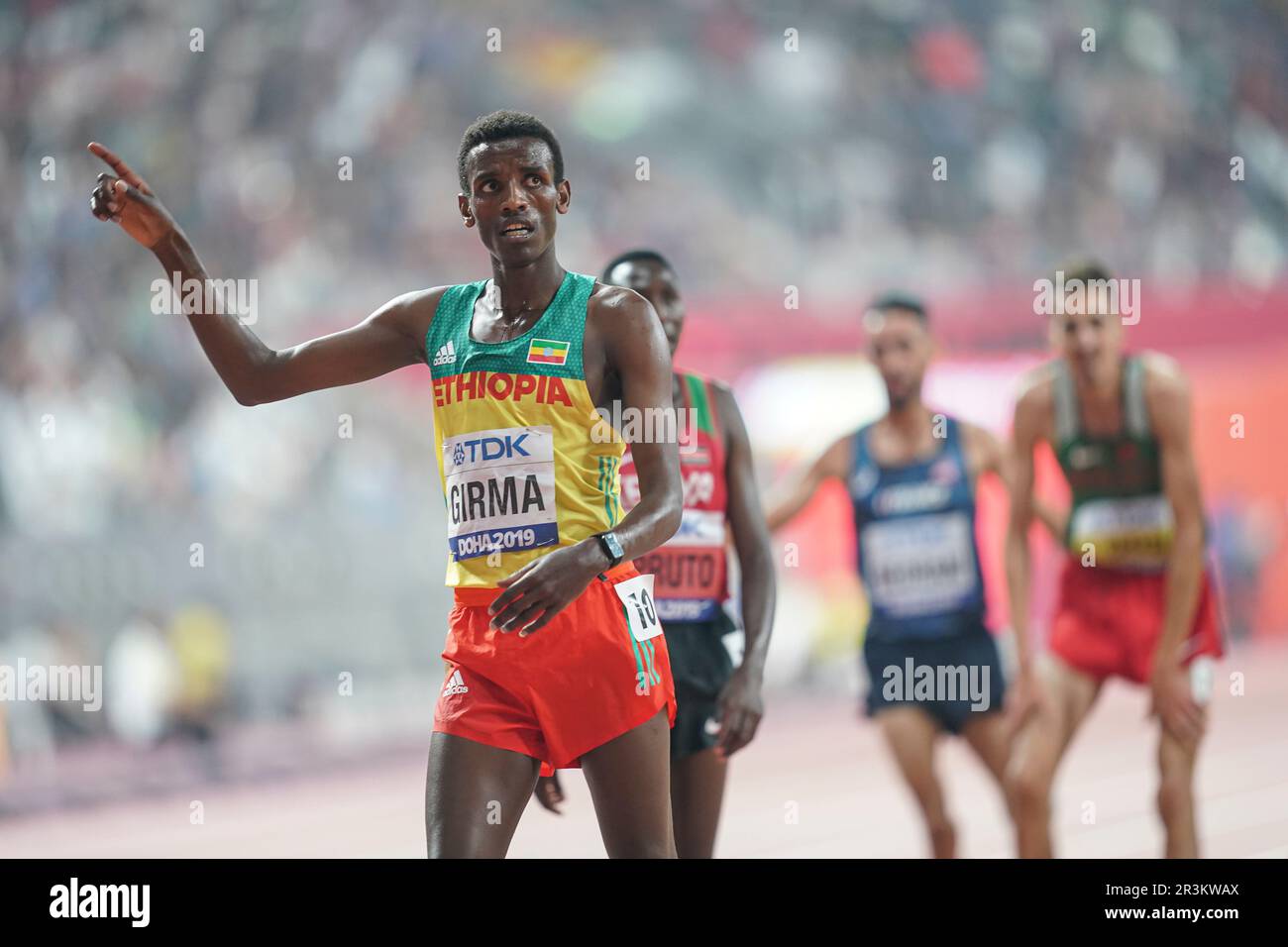Lamecha Girma participating in the 3000 meter steeplechase at the Doha