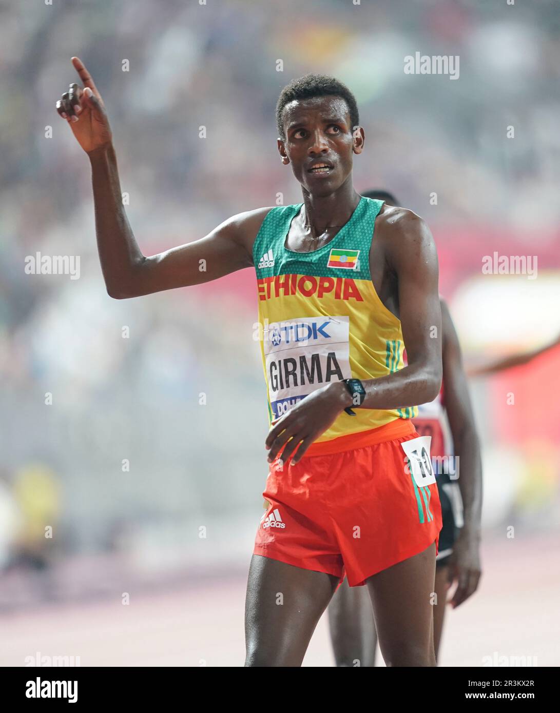 Lamecha Girma participating in the 3000 meter steeplechase at the Doha