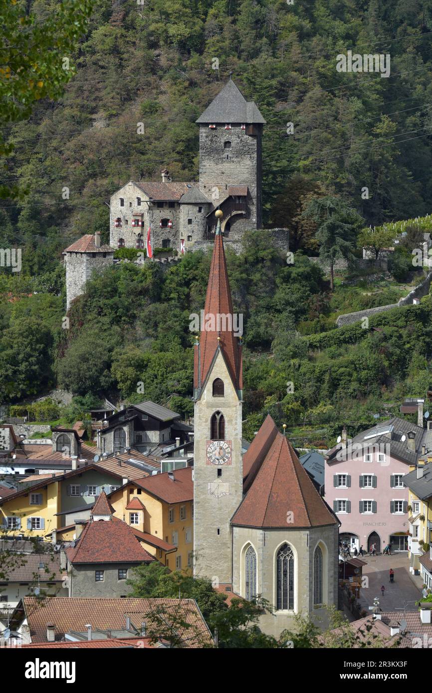 Bronzolo Castle and parish church of St. Andreas in Chiusa, South Tyrol Stock Photo