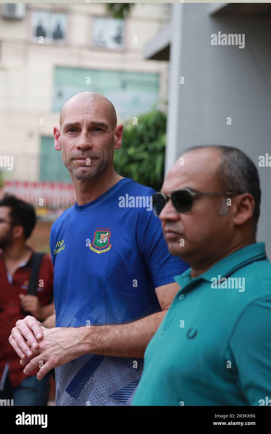Newly appointed Former Bermudian cricketer David Hemp (L) speaks to ...