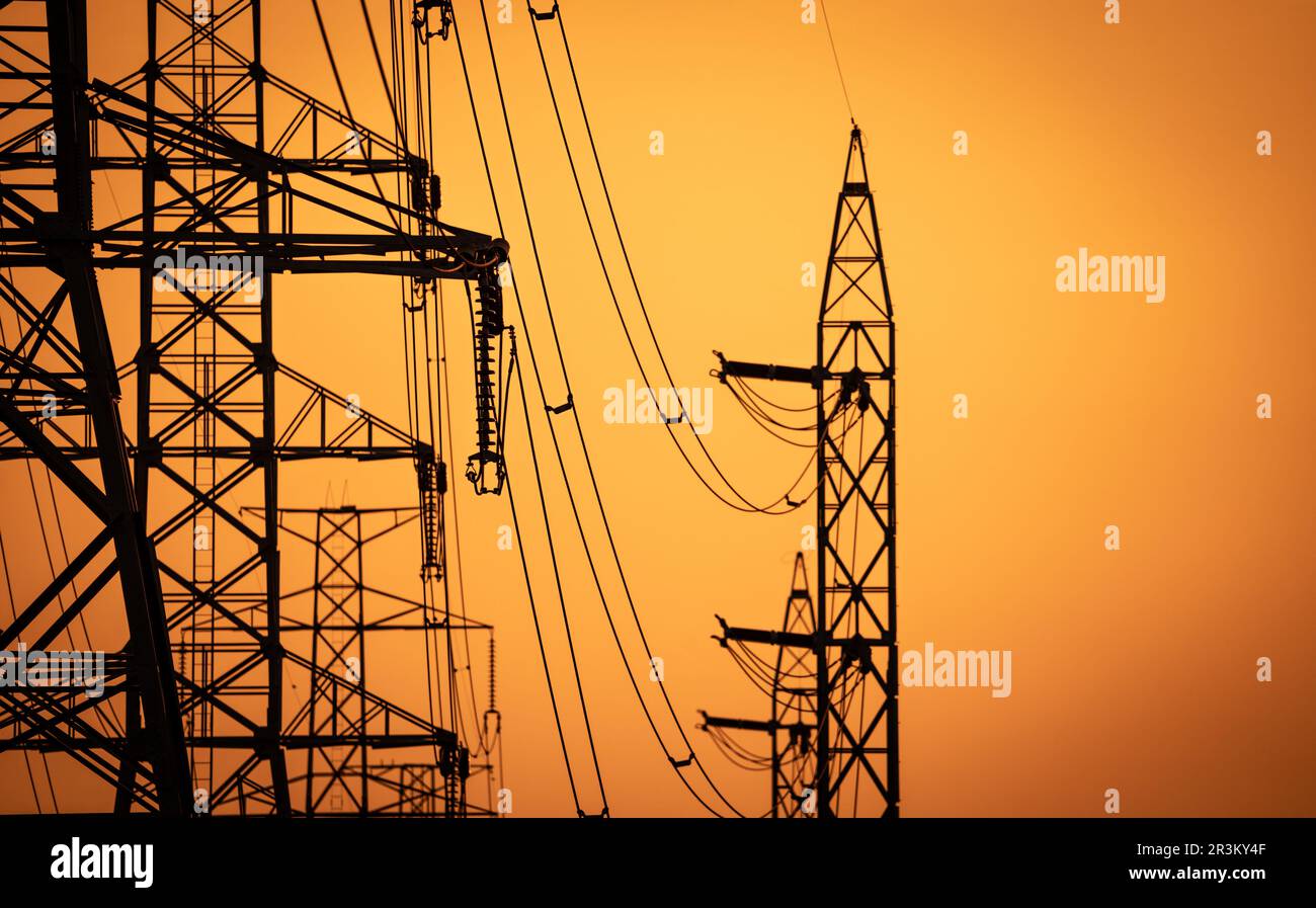 High voltage electric transmission tower. High voltage power lines on