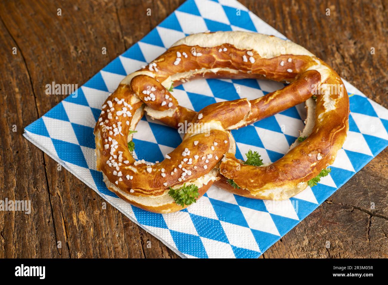 Bavarian butter pretzel on wood Stock Photo