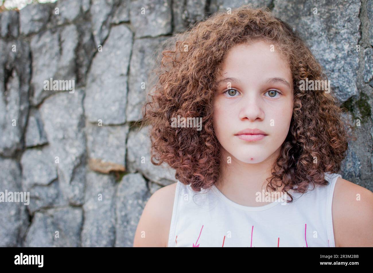 Portrait of curly hair girl Stock Photo - Alamy