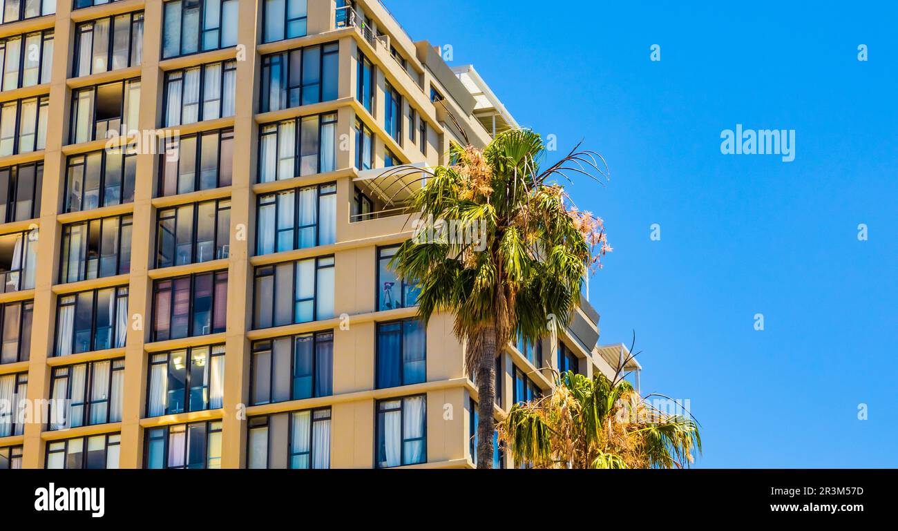 Modern contemporary apartment condo building with glass facade Stock ... - Modern Metal And Glass Condo Buildings