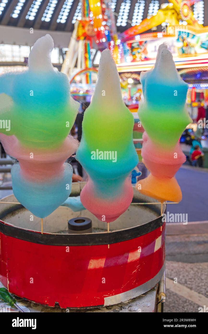 Rainbow Cotton Candy Floss Machine at Amusement Park Stock Photo