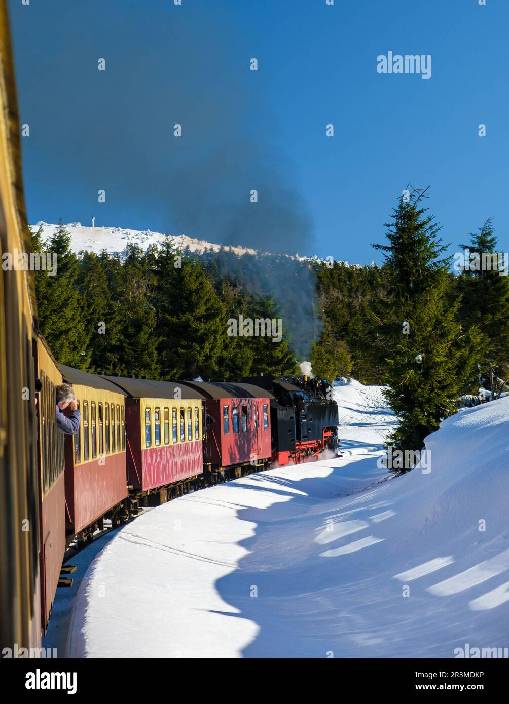 Steam train during winter in the snow in the Harz Germany Brocken Bahn Stock Photo