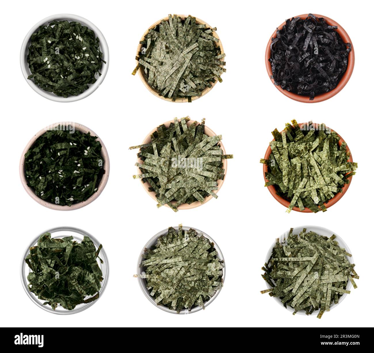 Set with tasty chopped crispy nori sheets on white background, top view Stock Photo