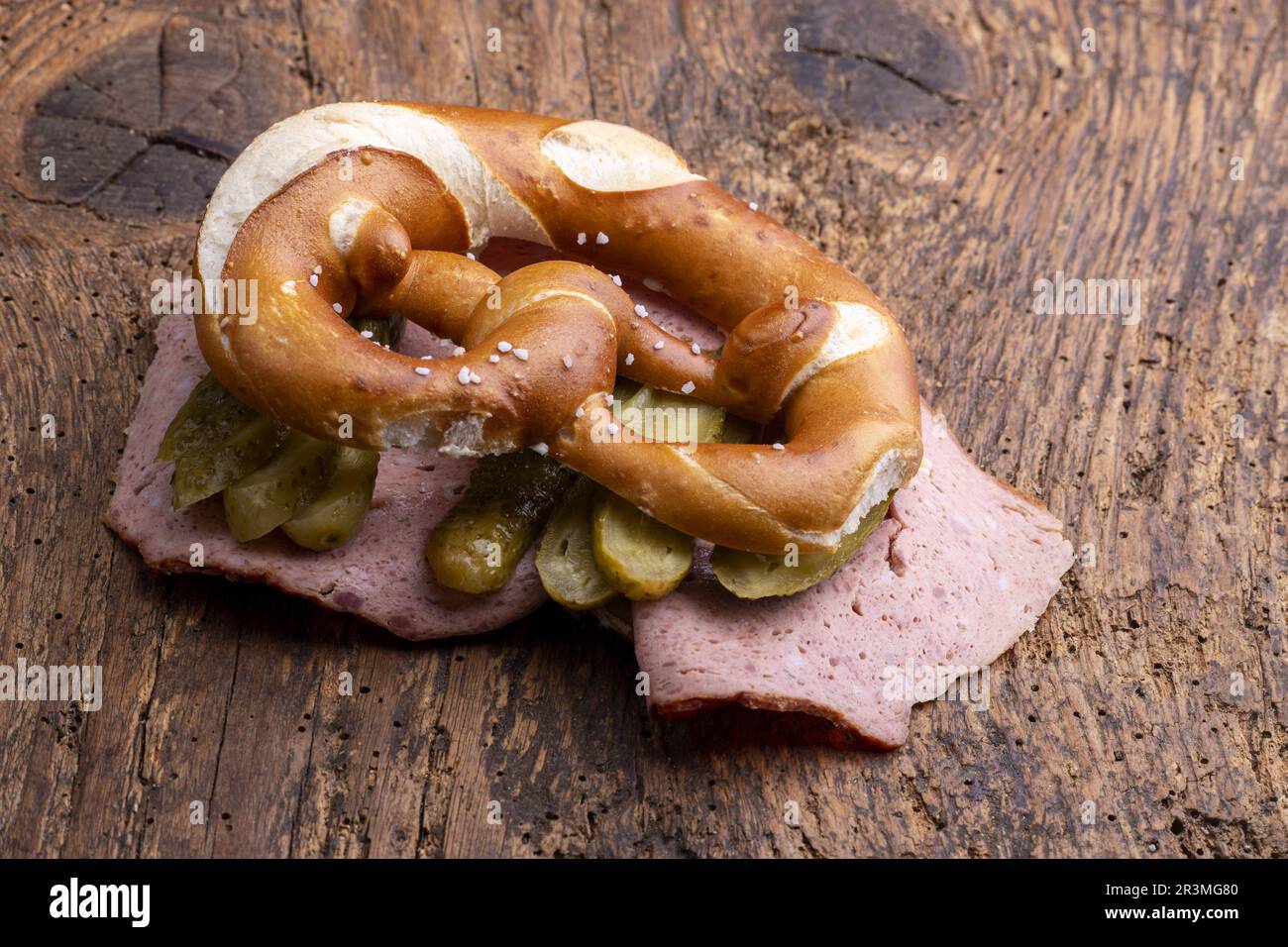 Meat loaf in a pretzel on wood Stock Photo