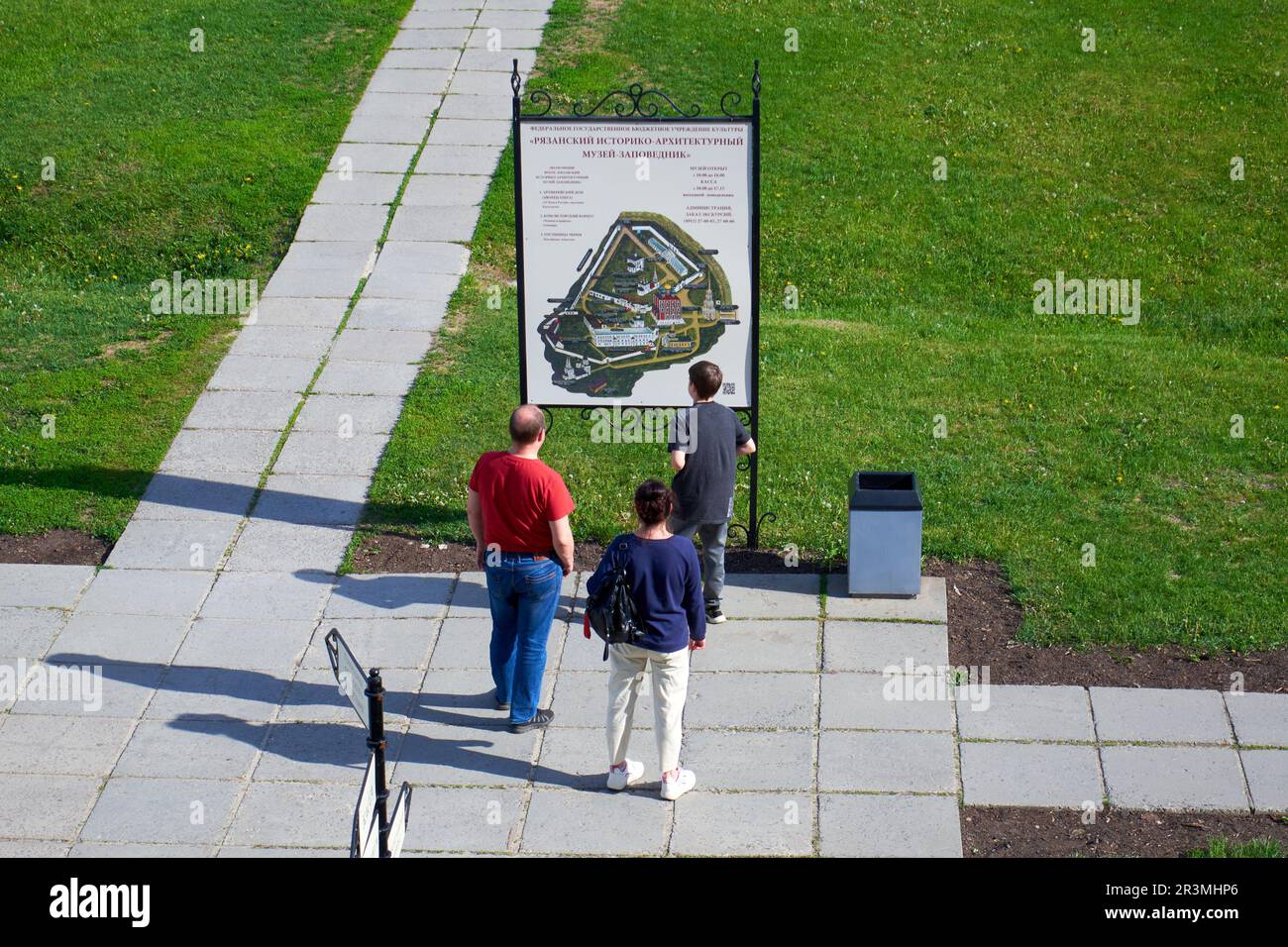 Tourists look at a map of the territory of the Ryazan Kremlin Museum Stock Photo