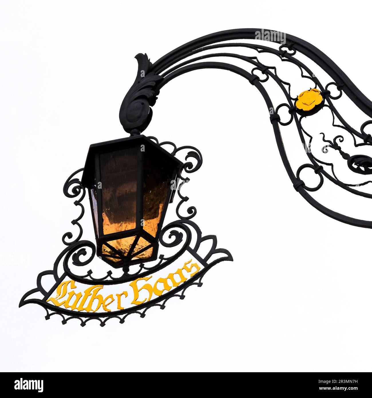 Wrought-iron lamp with a plaque at the Lutherhaus, Eisenach, Thuringia, Germany, Europe Stock Photo