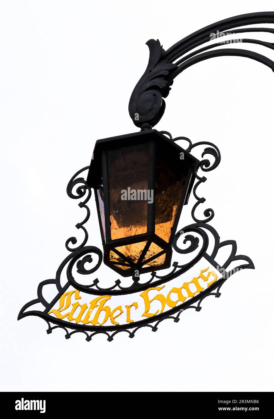 Wrought-iron lamp with a plaque at the Lutherhaus, Eisenach, Thuringia, Germany, Europe Stock Photo