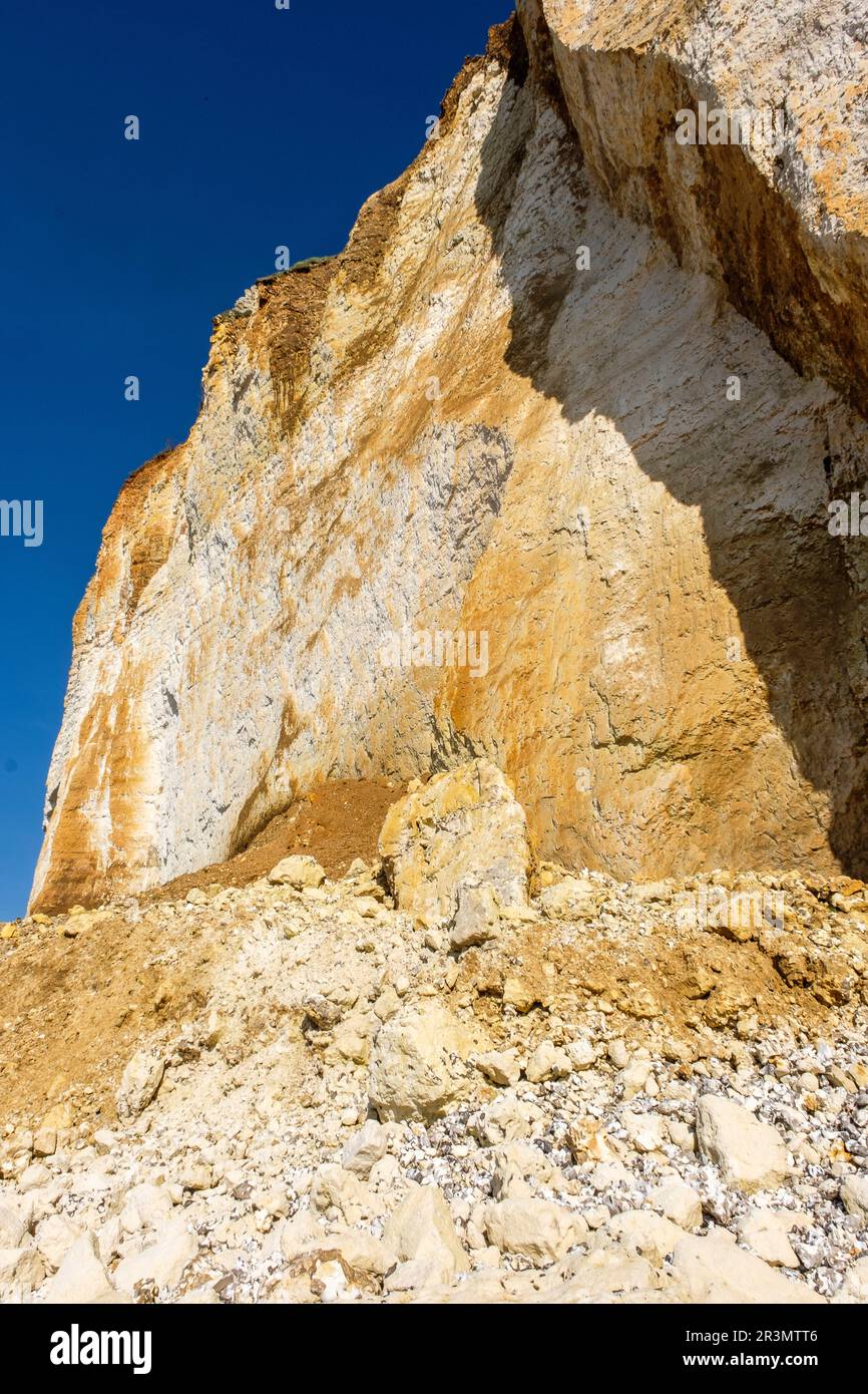 The pebble beach and the cliffs at Saint-Pierre-En-Port - Part of the ...