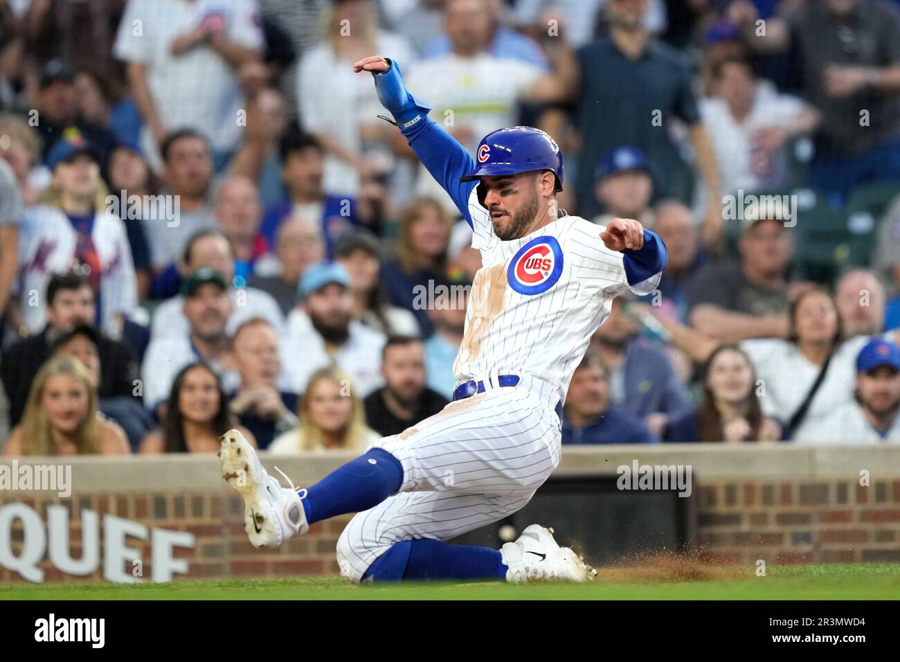 Chicago Cubs' Mike Tauchman scores in a baseball game against the New