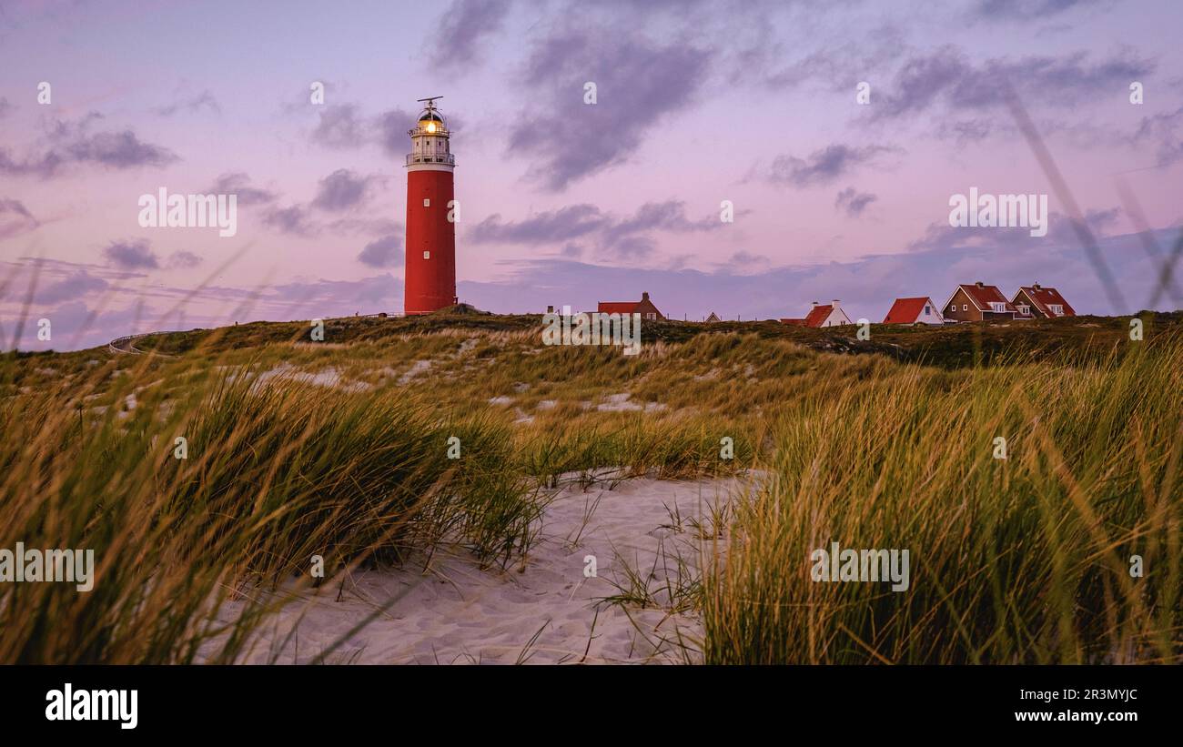 Texel lighthouse during sunset Netherlands Dutch Island Texel Holland Stock Photo