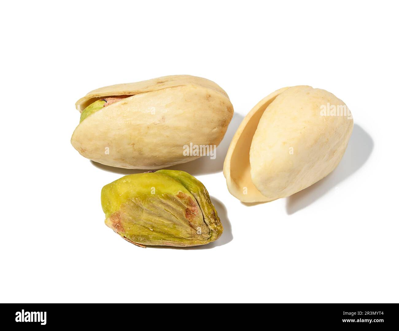 Salted open inshell pistachios isolated on a white background, tasty