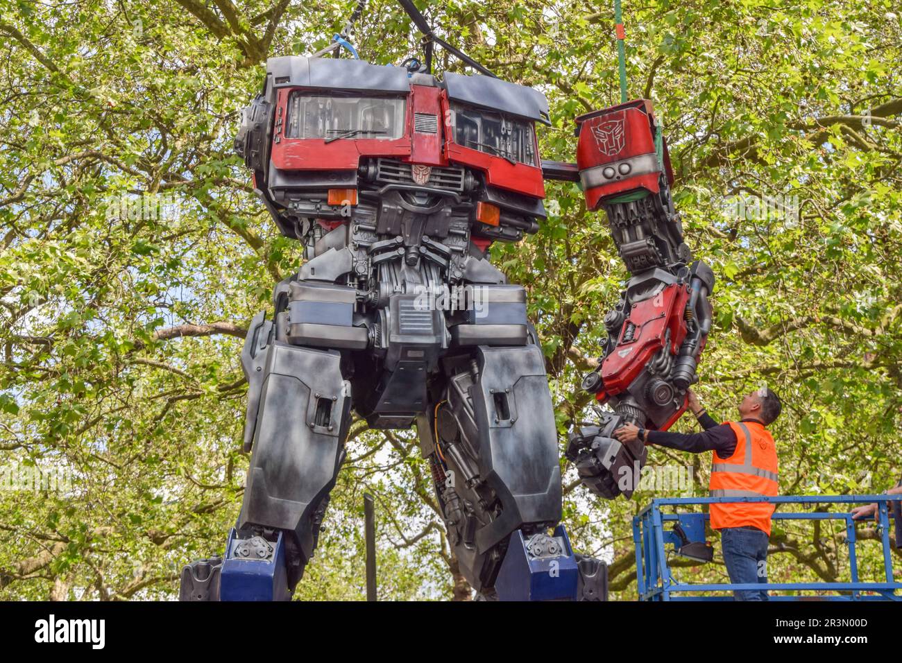 London, England, UK. 24th May, 2023. A worker attaches an arm to the