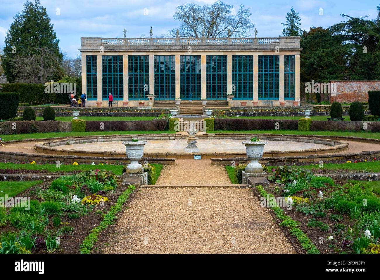 Formal gardens and Orangery at Belton House is a Grade I listed country house near Grantham in Lincolnshire, England Stock Photo