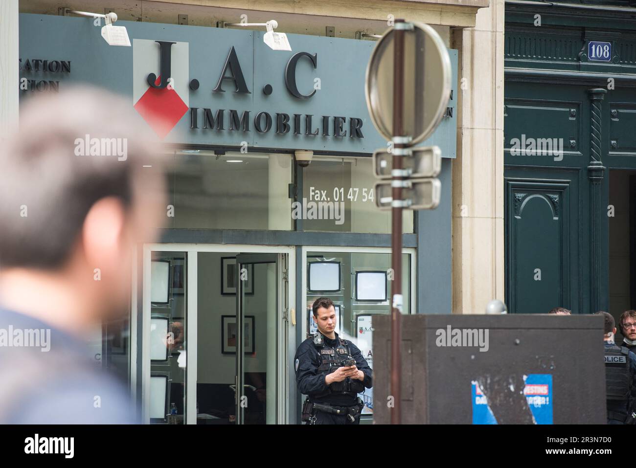 Paris, France. 24th May, 2023. The real estate agency J.A.C Immobilier  where the victim worked (his father is the boss of the agency). Man died  after being targeted by several shots, this