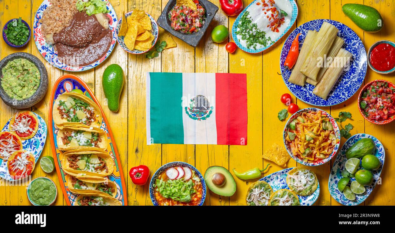 Mexican festive food for independence day independencia - around mexican flag. Top view , Yellow background. Stock Photo