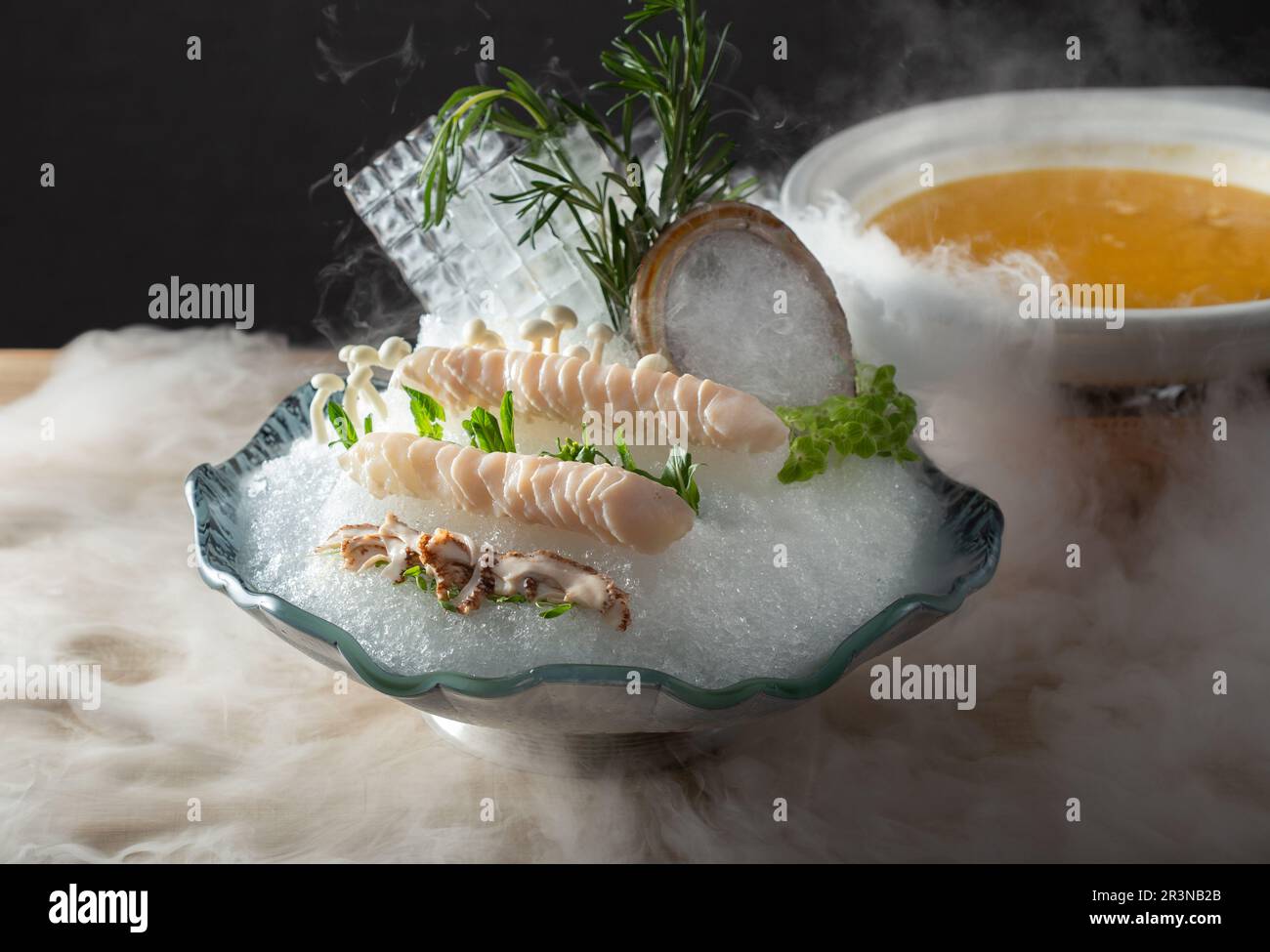 slice Australia abalone and dry ice on ice for hot pot, Yakiniku