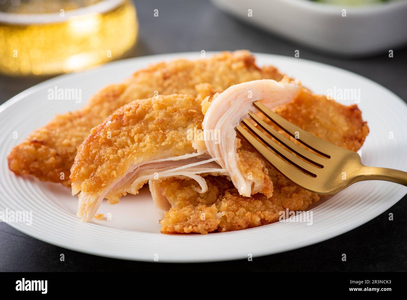 crispy chicken fillet in bread crumbs, closeup Stock Photo Alamy