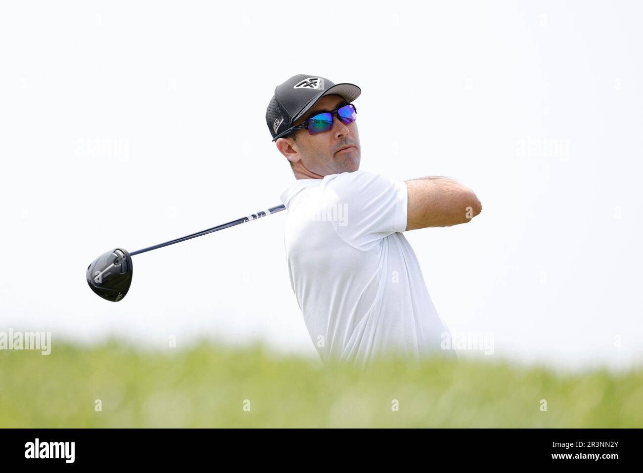 Cameron Tringale of HyFlyers GC hits his shot from the 11th tee during